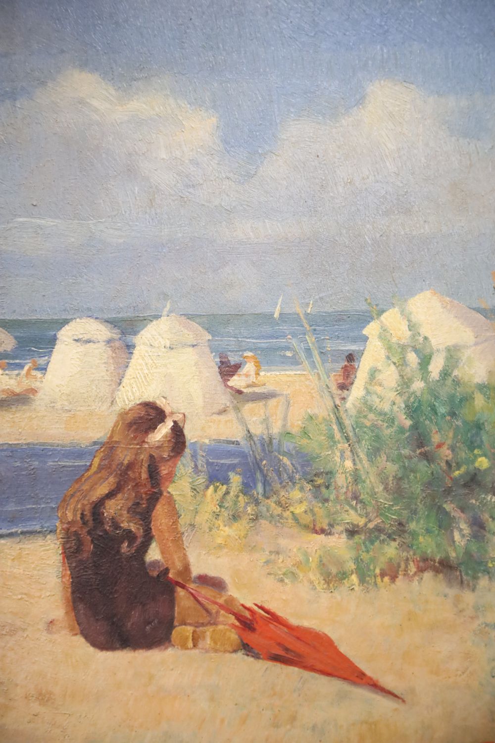 F. Jillanelli, oil on board, Girl seated on a beach, signed, 40 x 34cm